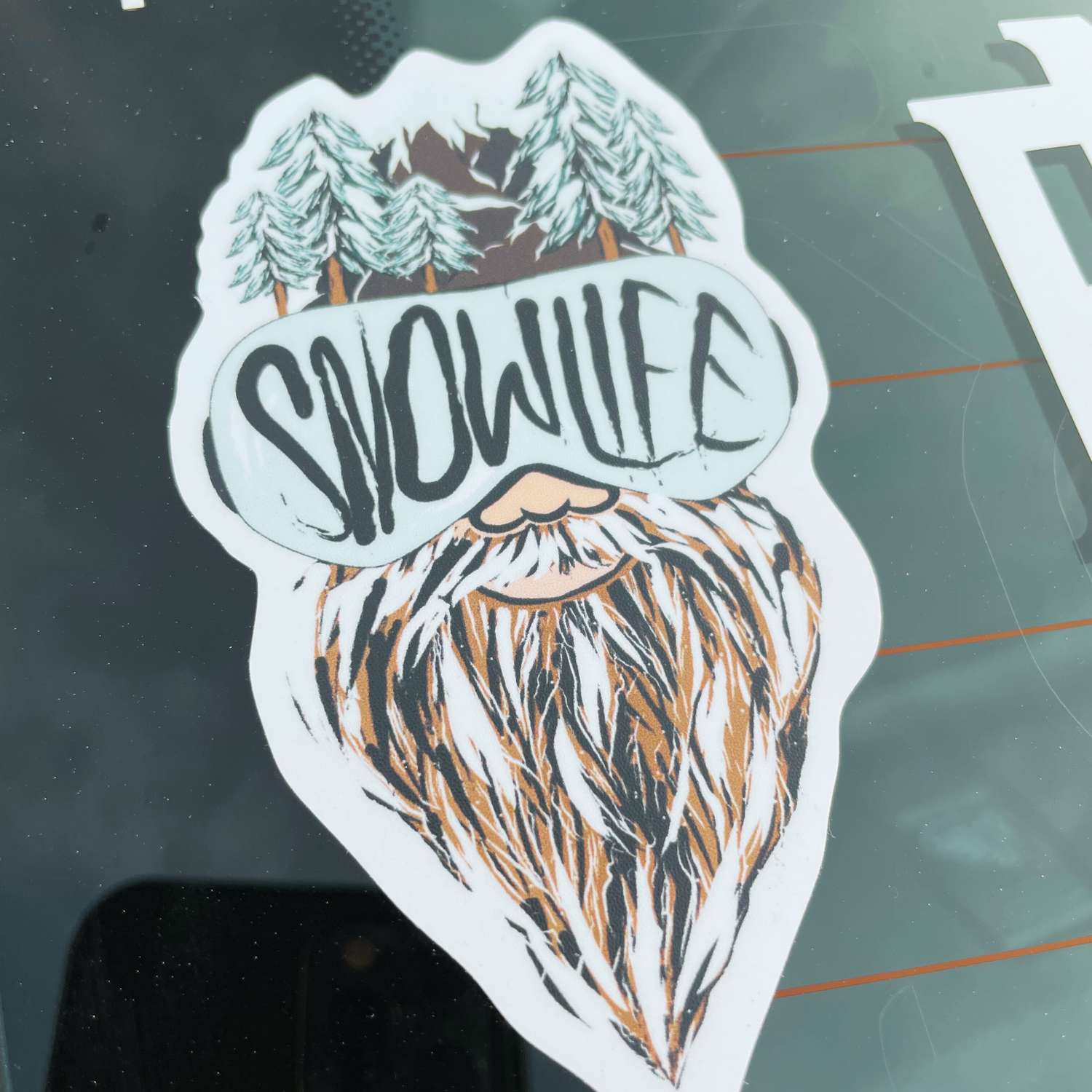 A Snow Life decal spotted on a windshield